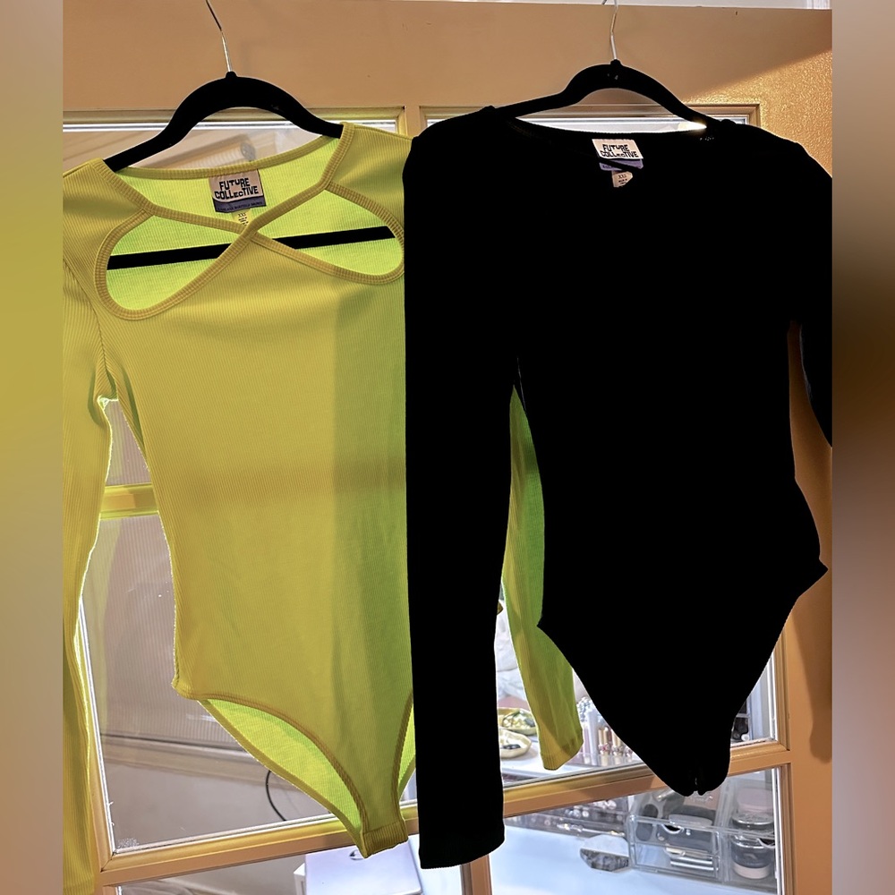 Two long sleeve cutout detail bodysuits
